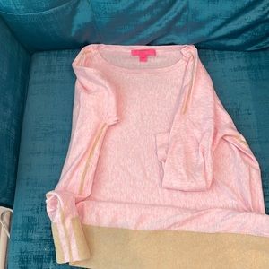 Large lily Pulitzer, sweater with tan striping on sleeve and wide band at bottom